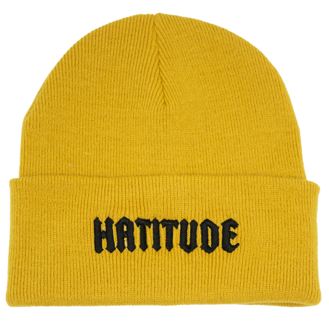 Hatitude gul mössa med svart HATITUDE-brodyr fram
